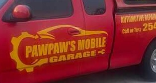 PawPaw's Mobile Garage branding from service truck