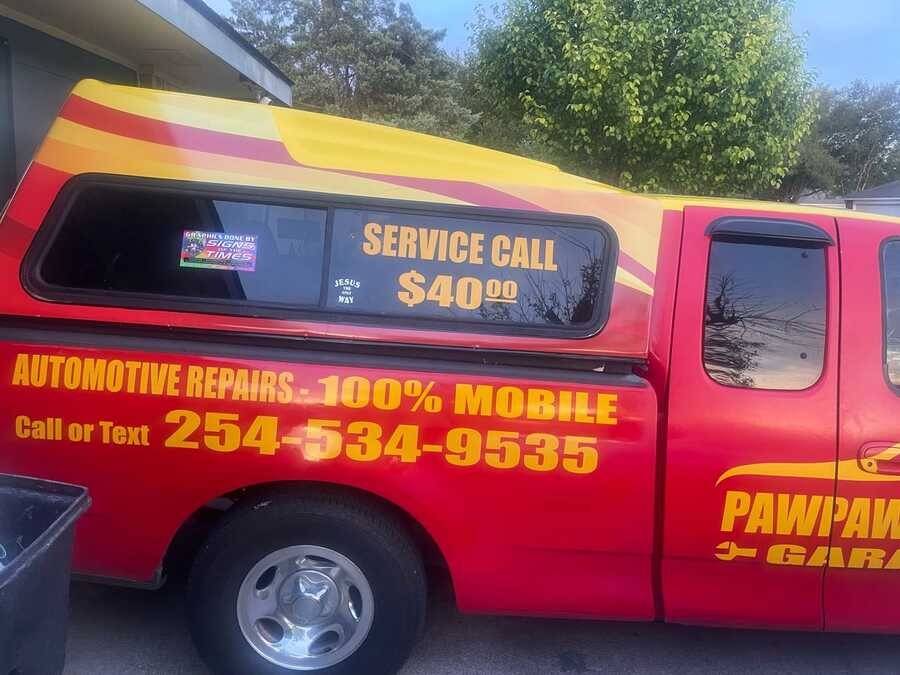 PawPaw's Mobile Garage truck showing 100% mobile auto repair