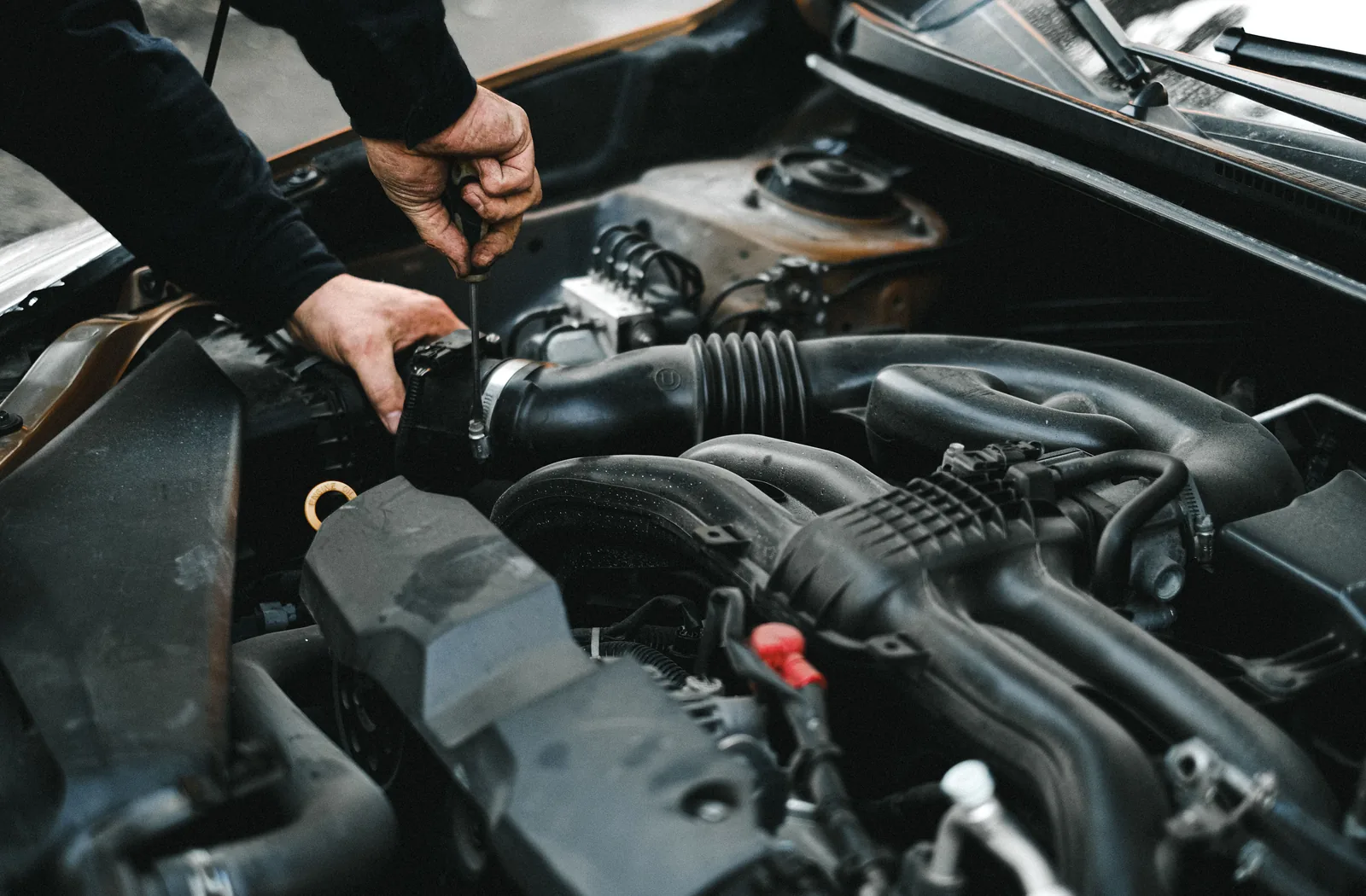 Automotive engine bay during under-hood service and air-conditioning diagnosis
